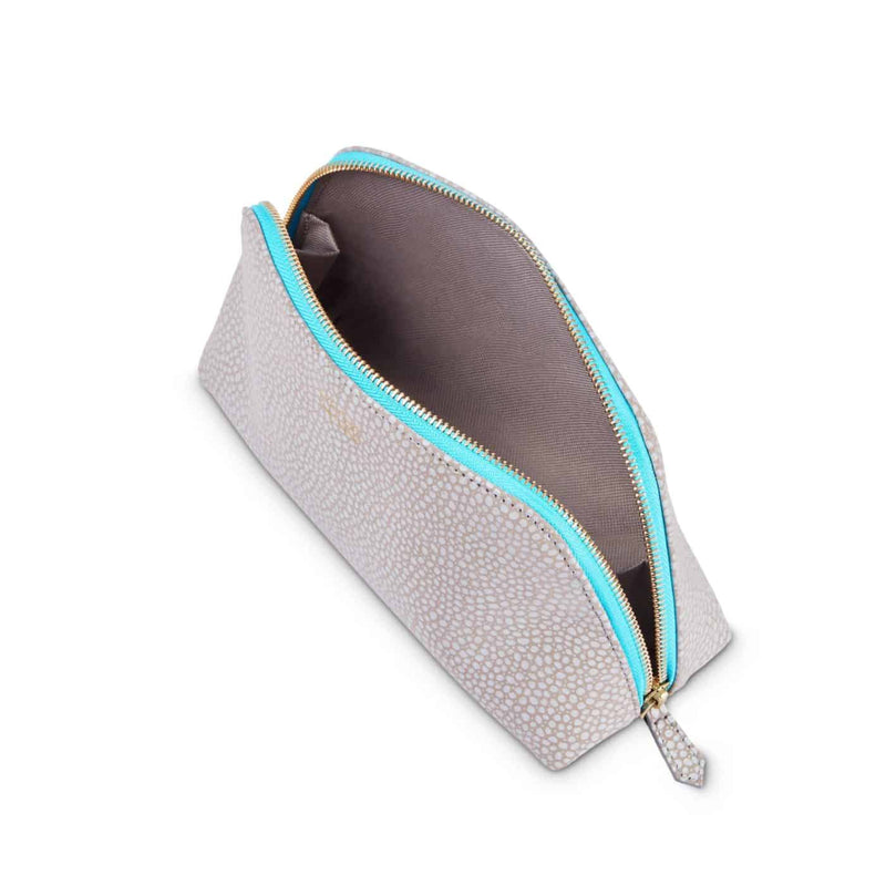PADFIELD British Made designer grey leather make up bag with waterproof canvas lining and bright blue colour pop zip sustainably made in England designer leather travel accessory