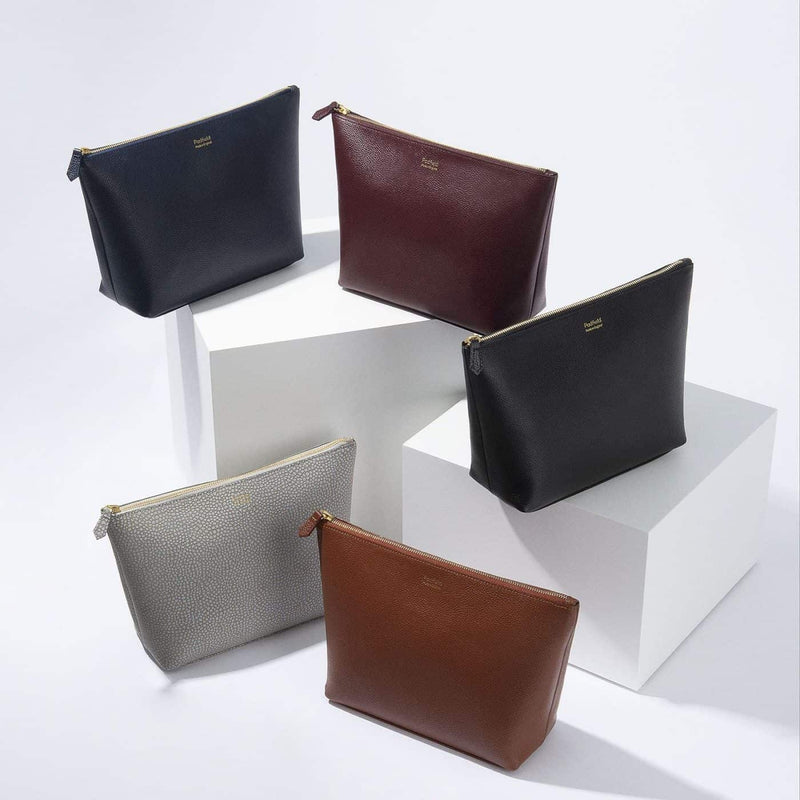 Stylish slimline British designer wash toiletry wash pouches made in England luxury leather travel accessories