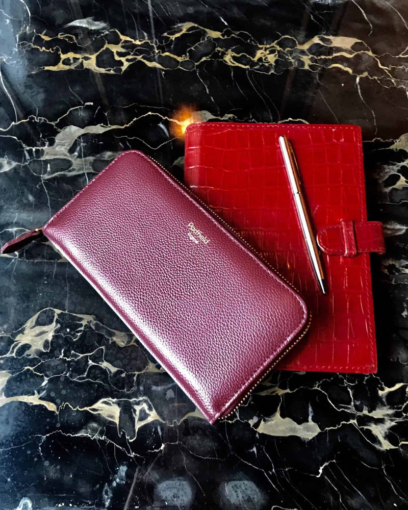 A stylish and practical Padfield Burgundy Leather Zip Purse Made in England UK