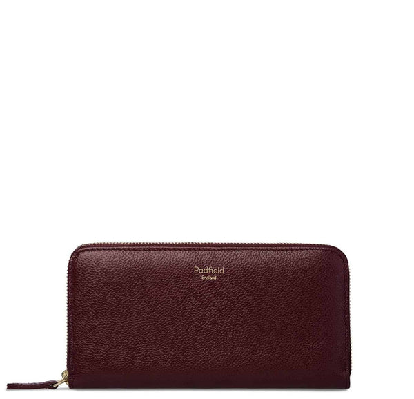 A stylish British designer burgundy leather zip purse sustainably Made in England UK