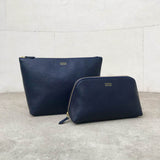 Shop made in England designer British navy blue unisex leather toiletry wash bags Designed in London luxury leather gift for him and her